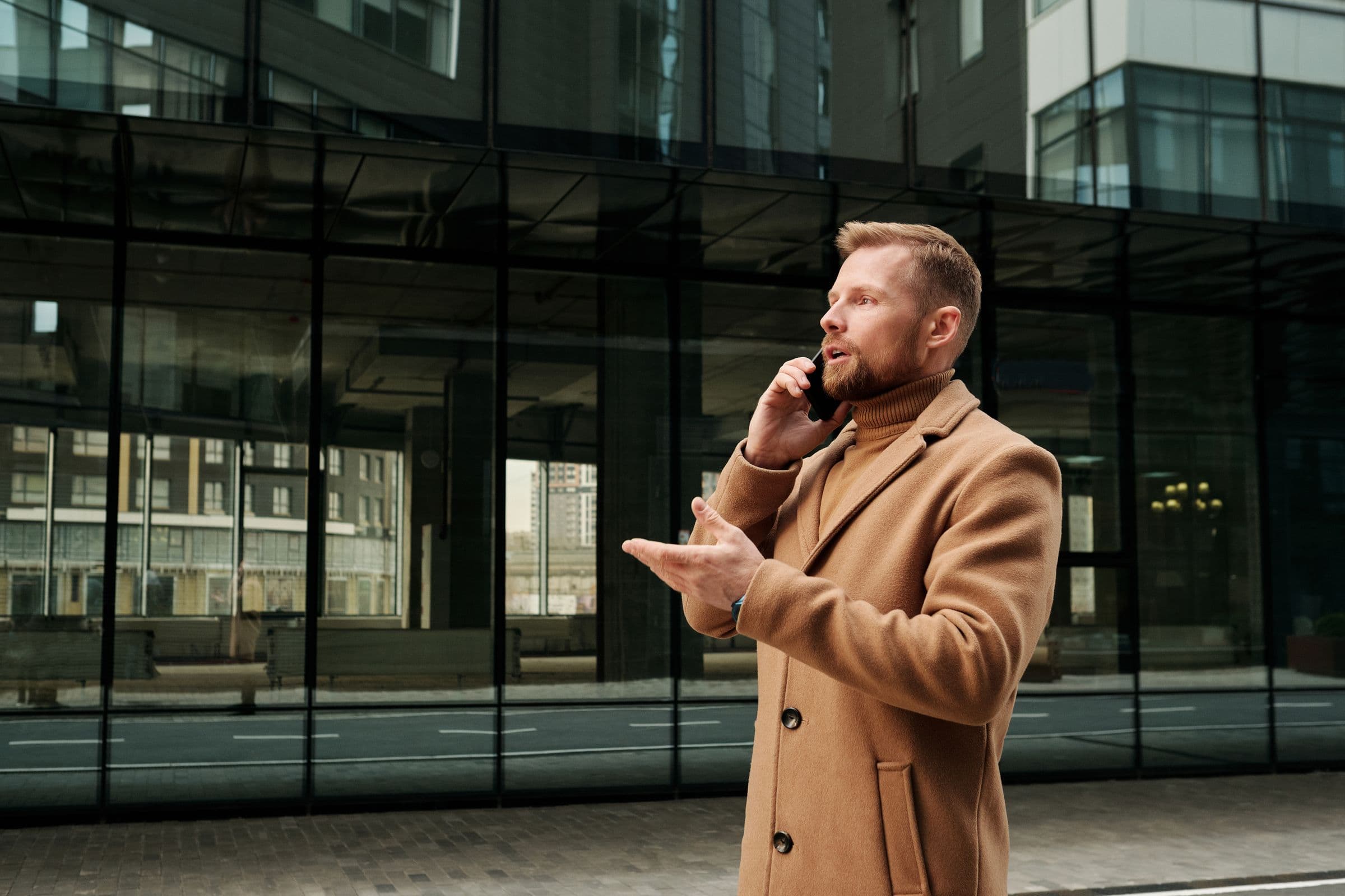 A businessman on a phone call in his office
